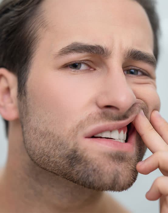 Man with toothache